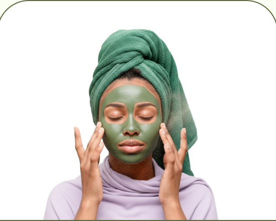 Woman applying qasil mask with a towel wrap